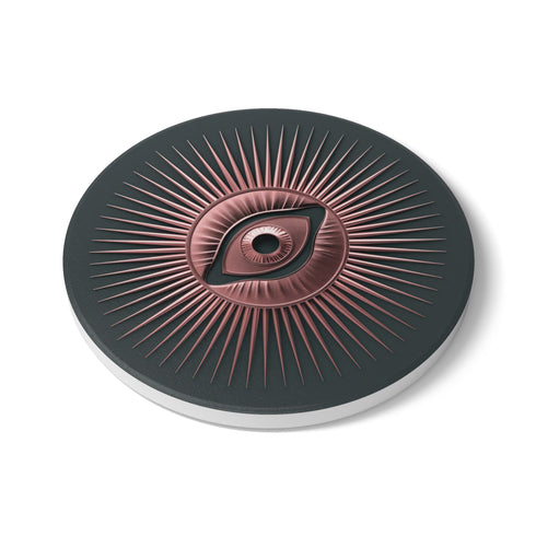 Round ceramic coaster featuring a sage green background with a detailed rose gold Evil Eye symbol in the center, surrounded by radiating metallic rays in a sunburst pattern.